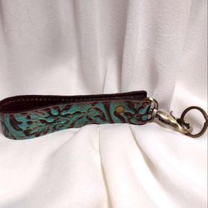 Leather wristlet with clip